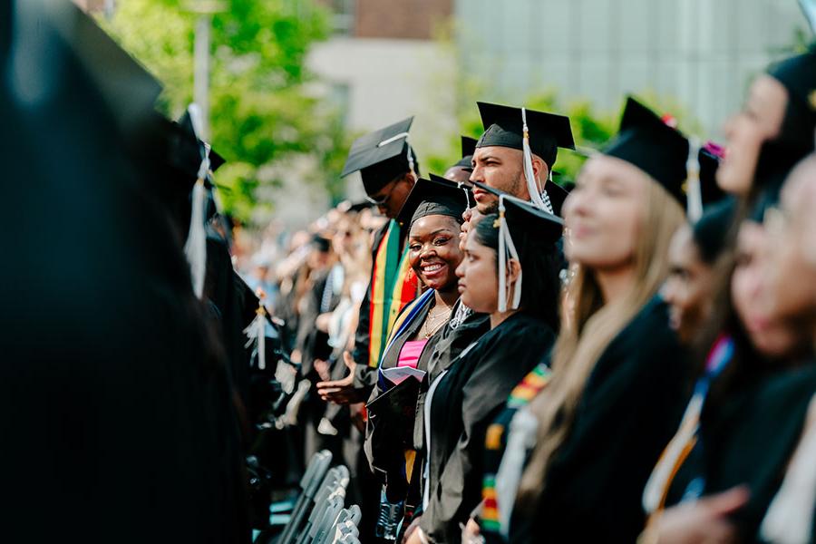 Undergrads smiling at commencement