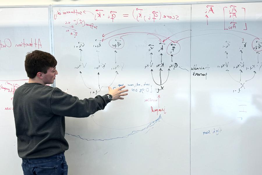 Jacob Adamczyk at white board